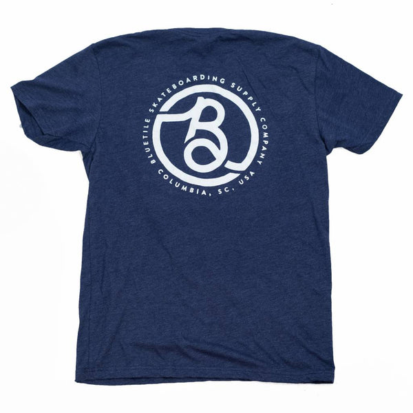 A BLUETILE SUPPLY CO - BLUE / WHITE t-shirt with a Bluetile Skateboards logo on it, offering quality and style.