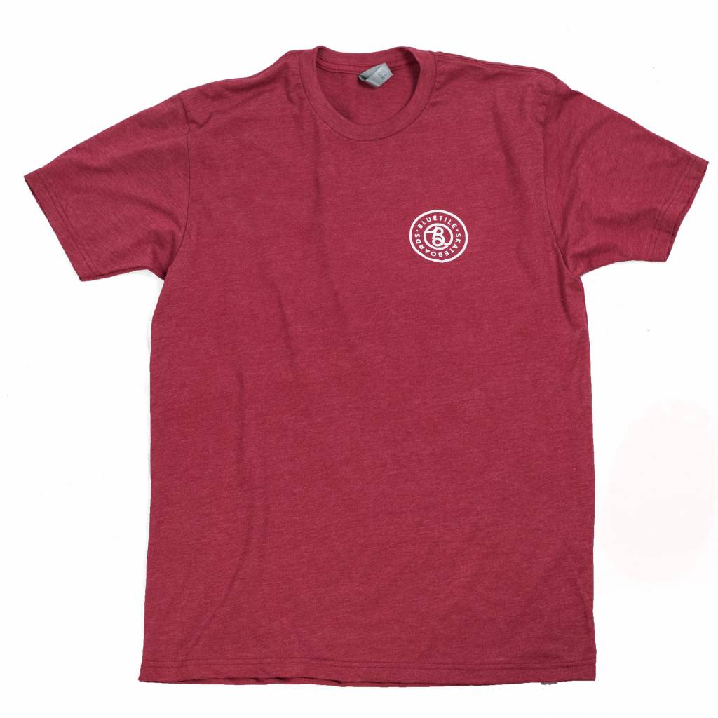 A BLUETILE SUPPLY CO - RED / WHITE t-shirt with a Bluetile Skateboards logo on it.