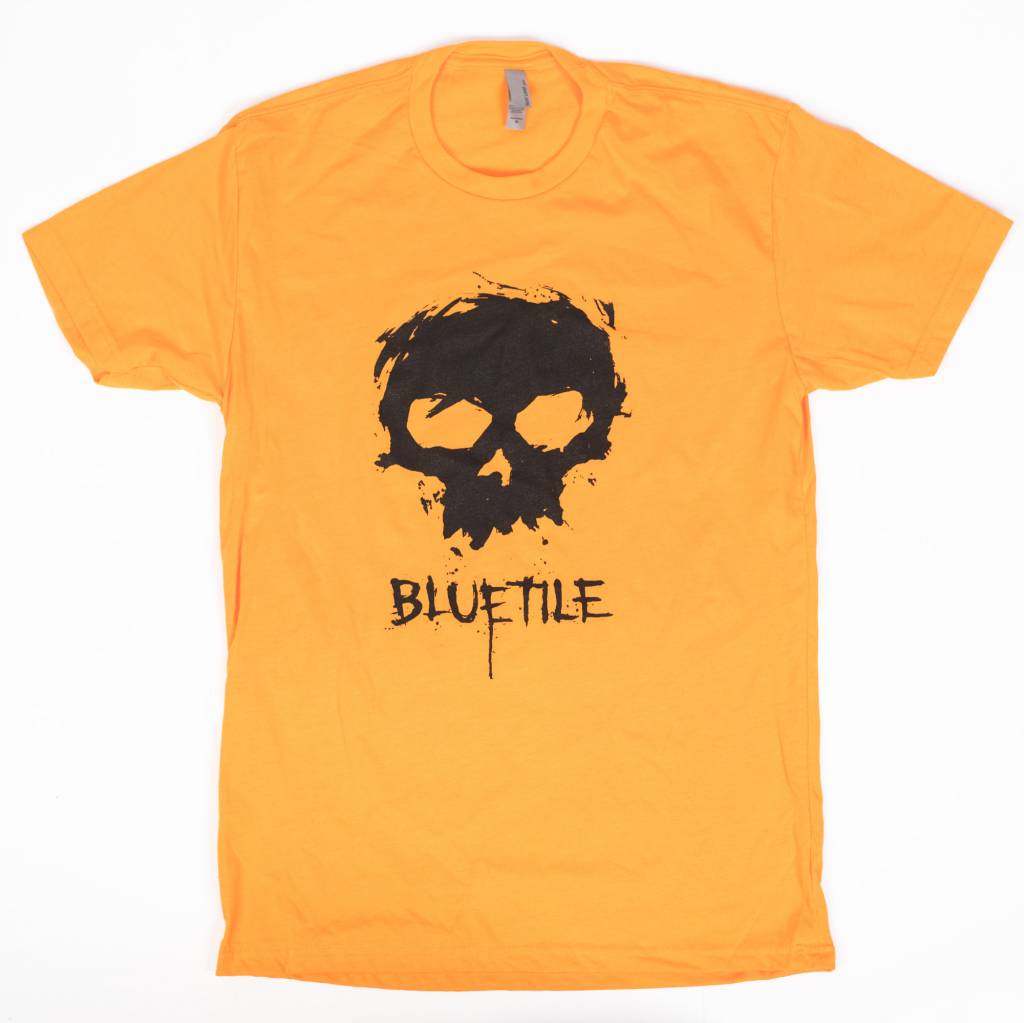 A limited edition ZERO X BLUETILE SKULL T-SHIRT ORANGE with a skull on it, made by Bluetile Skateboards.