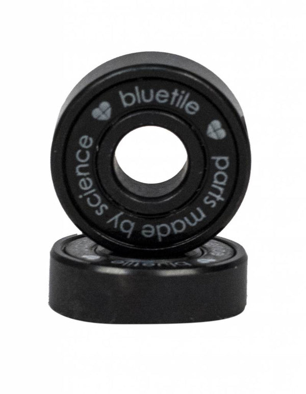 Two BLUETILE BEARINGS MADE BY SCIENCE on a white background.