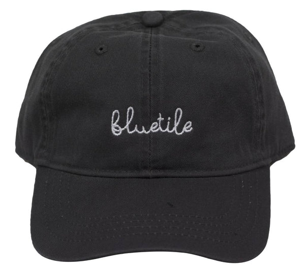 A BLUETILE SCRIPT DAD HAT GREY with the word'blue'embroidered on it.