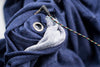 A close up of a Bluetile Skateboards BLUETILE LOVE BLUETILE PREMIUM HOODIE with a wire attached to it.