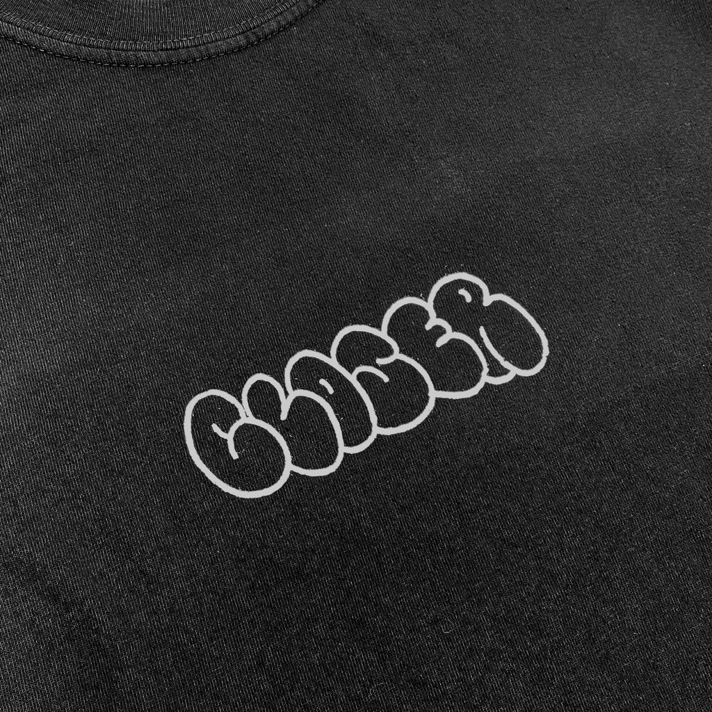 A CLOSER X MIKE GIGLIOTTI BUBBLE TEE BLACK with a white logo on it.