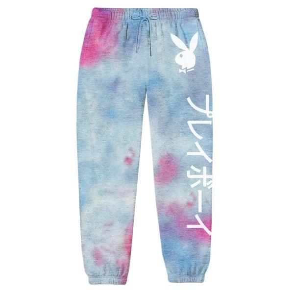 blue and pink tie dye sweatpants with a white japanese logo