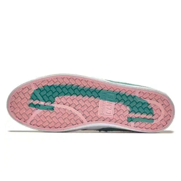 A pair of CONVERSE CONS X DIAL TONE PRO LEATHER VULC VINTAGE JADE sneakers with pink and green soles.