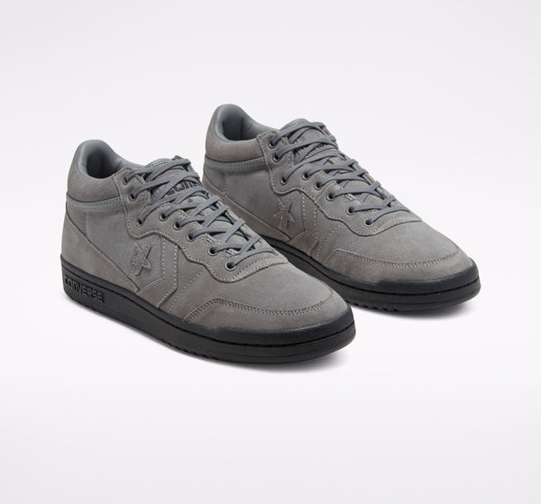 A pair of grey CONVERSE CONS FASTBREAK PRO MID MASON/BLACK sneakers on a white background.