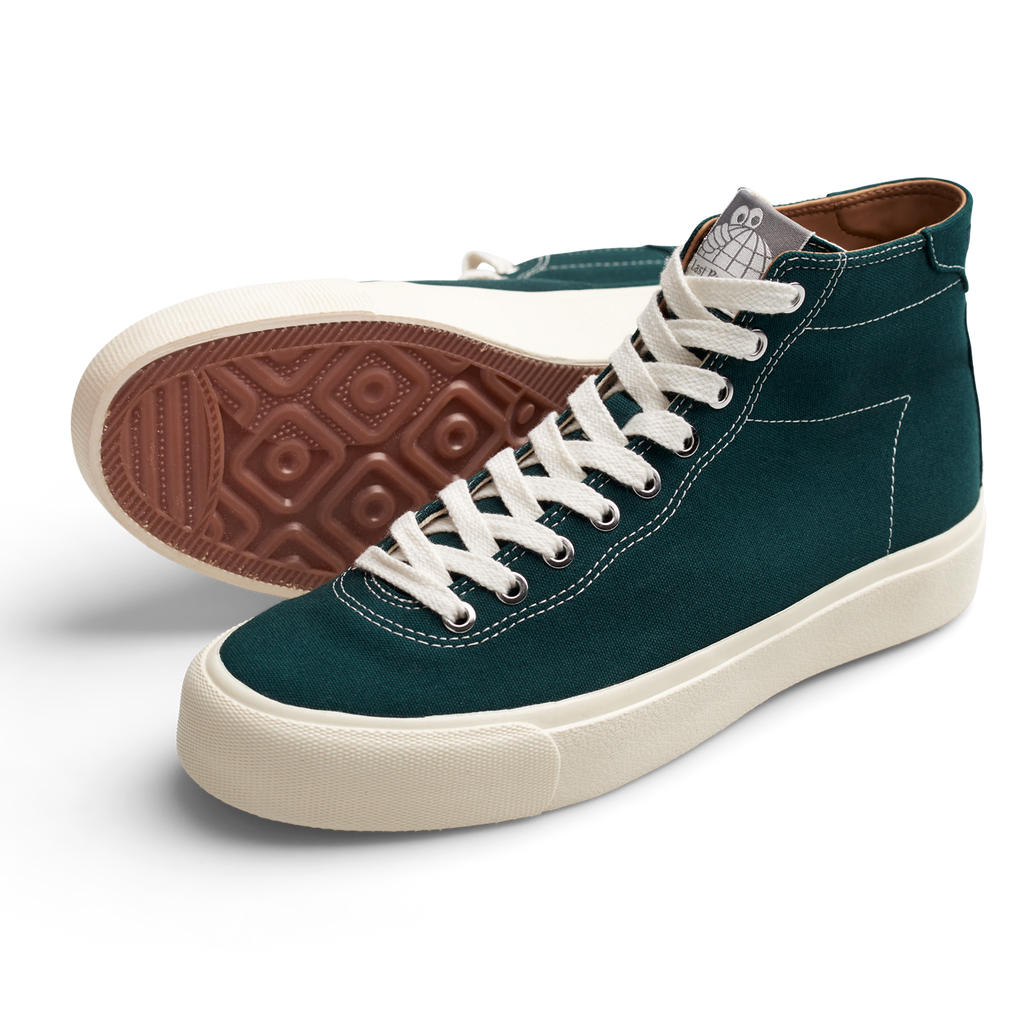 A pair of LAST RESORT AB emerald green sneakers with white soles, perfect for the last resort adventure.