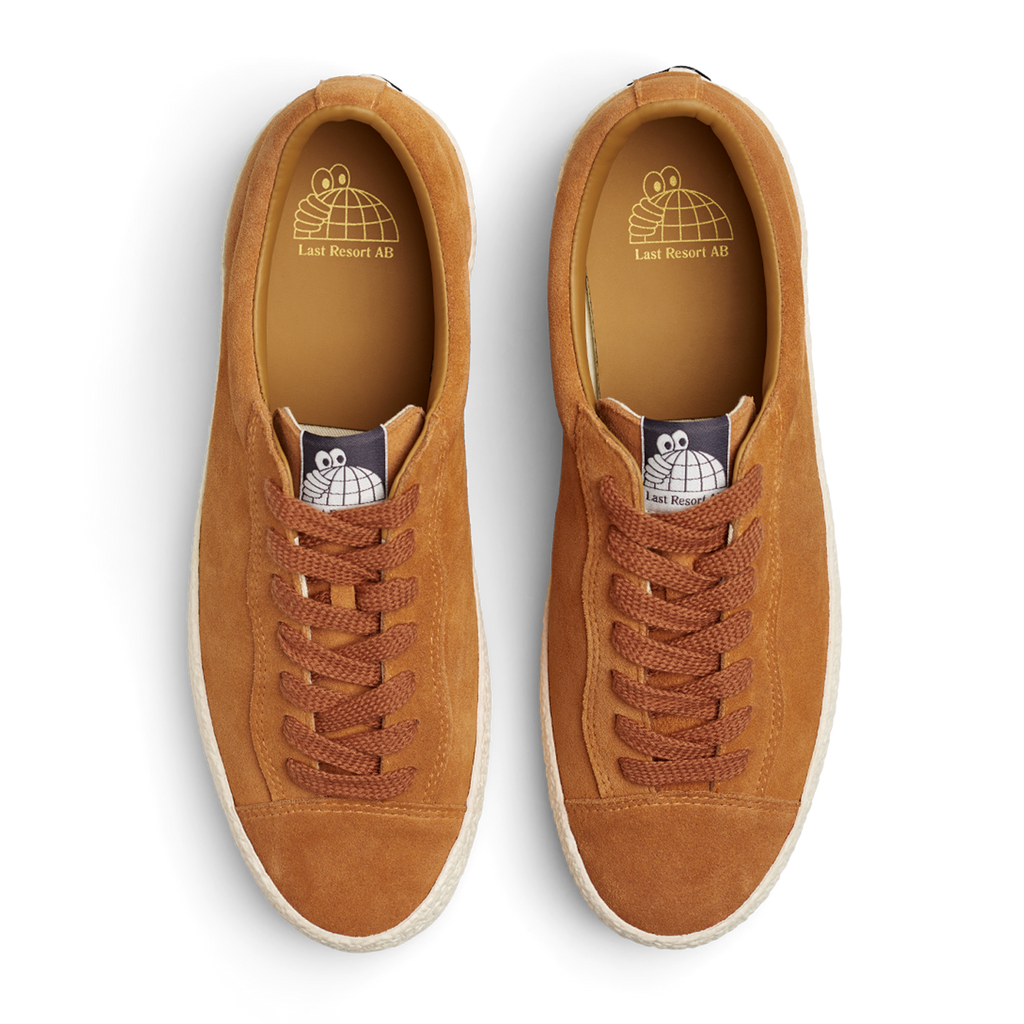 A pair of tan suede sneakers with white laces in LAST RESORT AB VM002 SUEDE LO CHEDDAR/WHITE from the brand Last Resort AB.