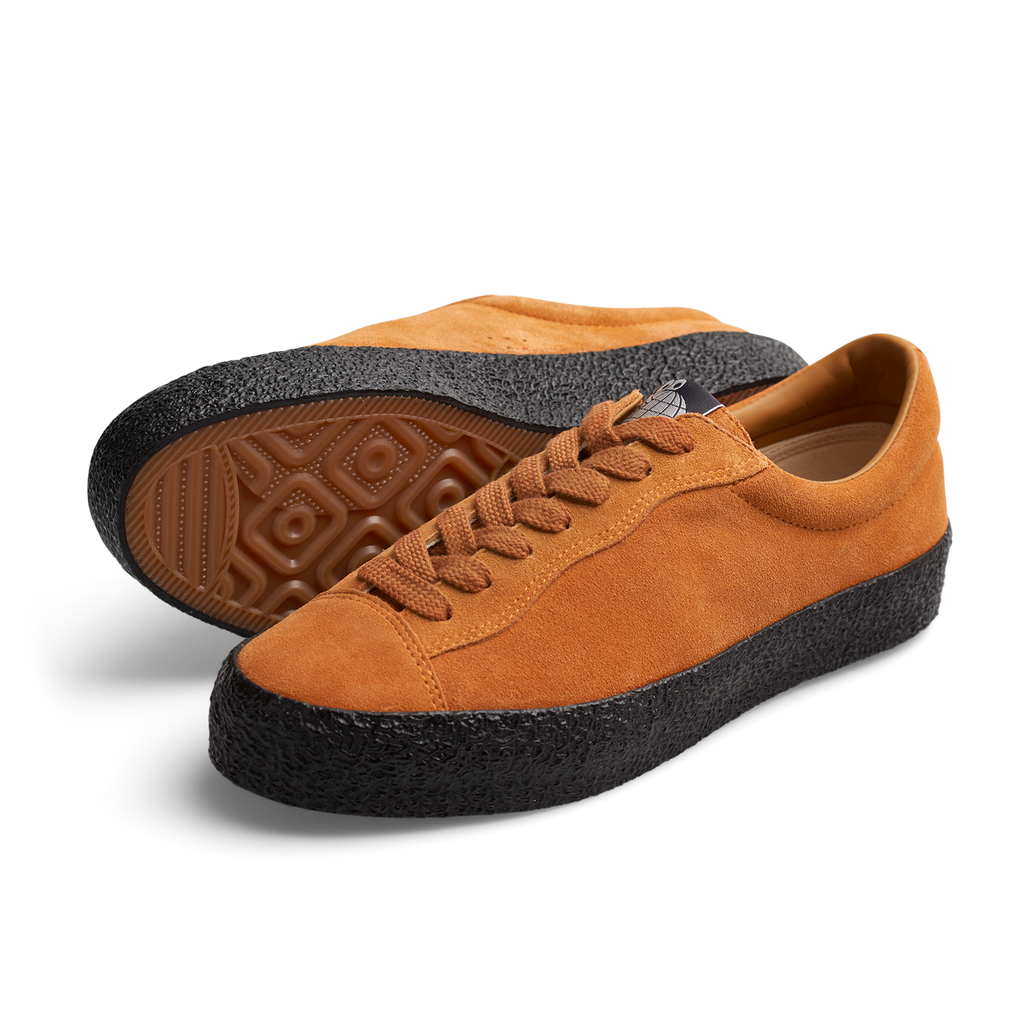 A pair of orange suede sneakers with black soles, LAST RESORT AB VM002 SUEDE LO CHEDDAR/BLACK by Last Resort AB.