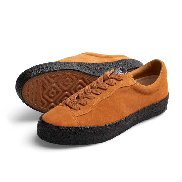 A pair of orange suede sneakers with black soles, LAST RESORT AB VM002 SUEDE LO CHEDDAR/BLACK by Last Resort AB.