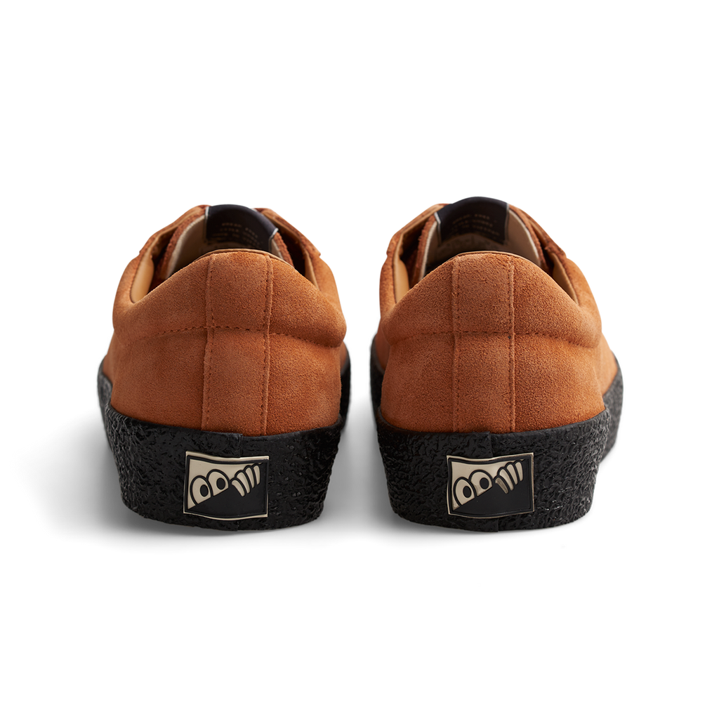 A pair of tan sneakers with black soles, LAST RESORT AB VM002 SUEDE LO CHEDDAR/BLACK by Last Resort AB.