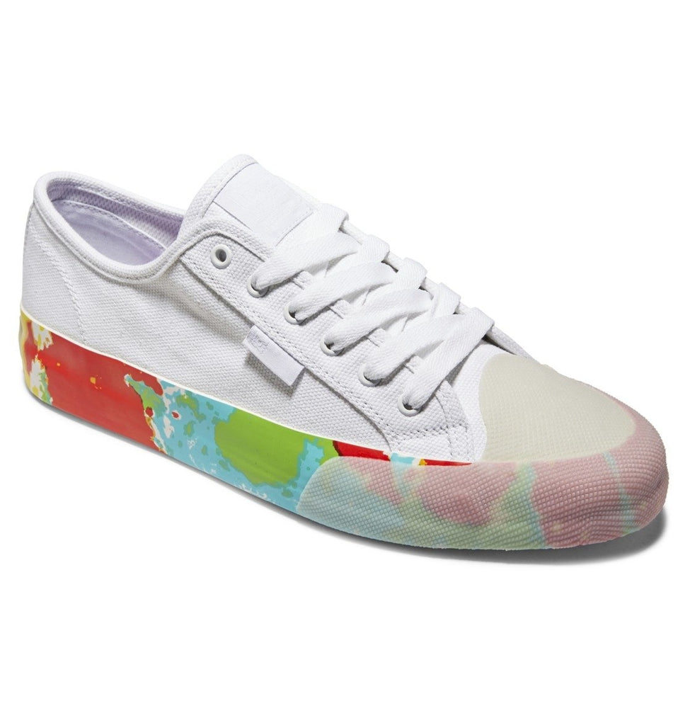 A women's white DC Manual RT S x Evan Smith White shoe with colorful paint on it.