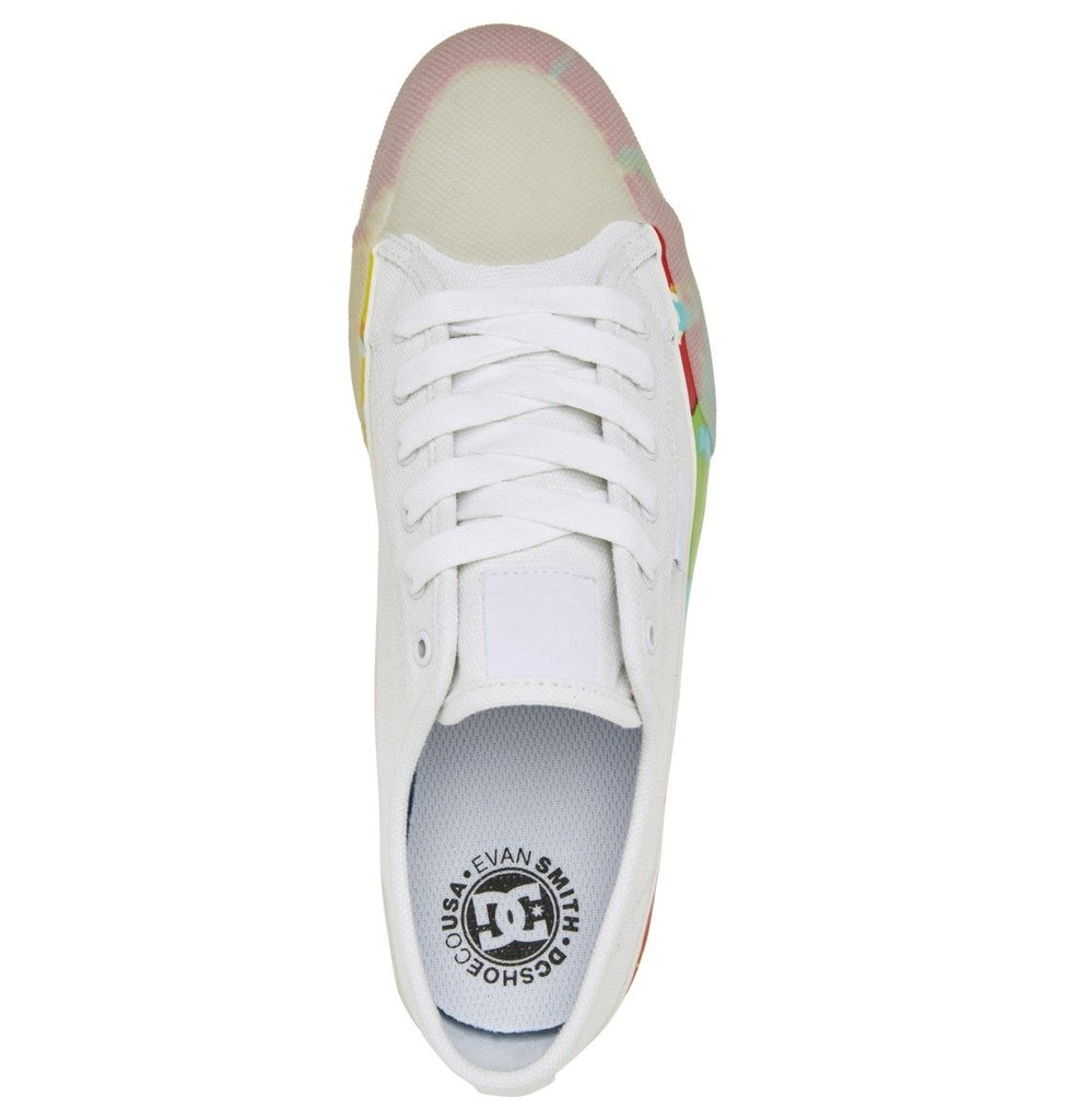 A white DC MANUAL RT S X EVAN SMITH WHITE shoe with multicolored stripes on it.
