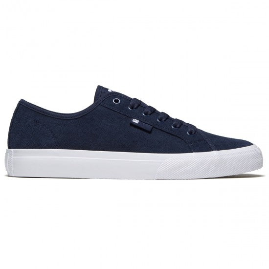 A navy shoe with a white sole.