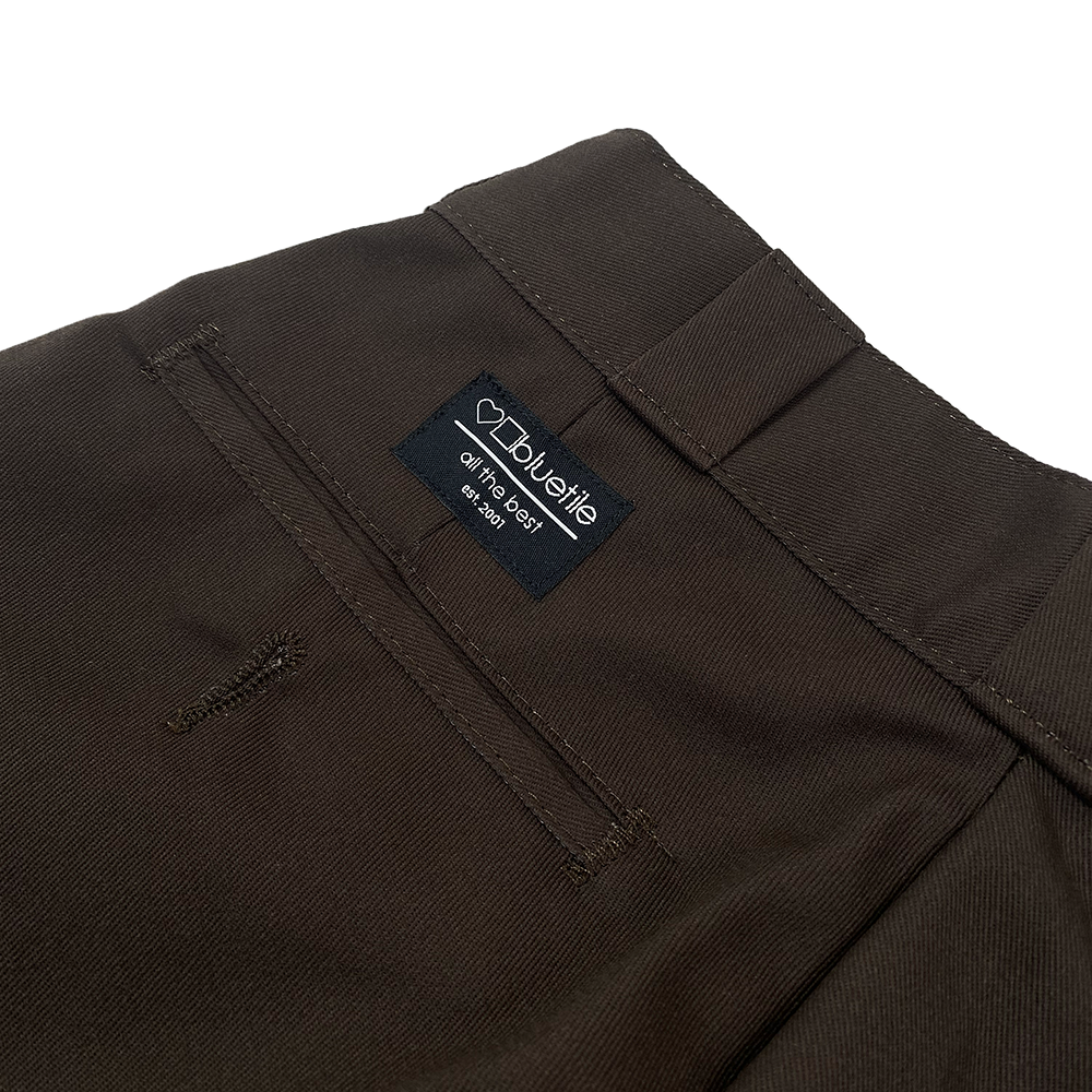 A close up of a Dickies Bluetile Double Knee Work Pant Brown with a label on it.
