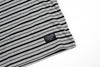 A soft and high-quality Bluetile Surplus Striped Tee Grey / Black t-shirt on a white surface, by Bluetile Skateboards.