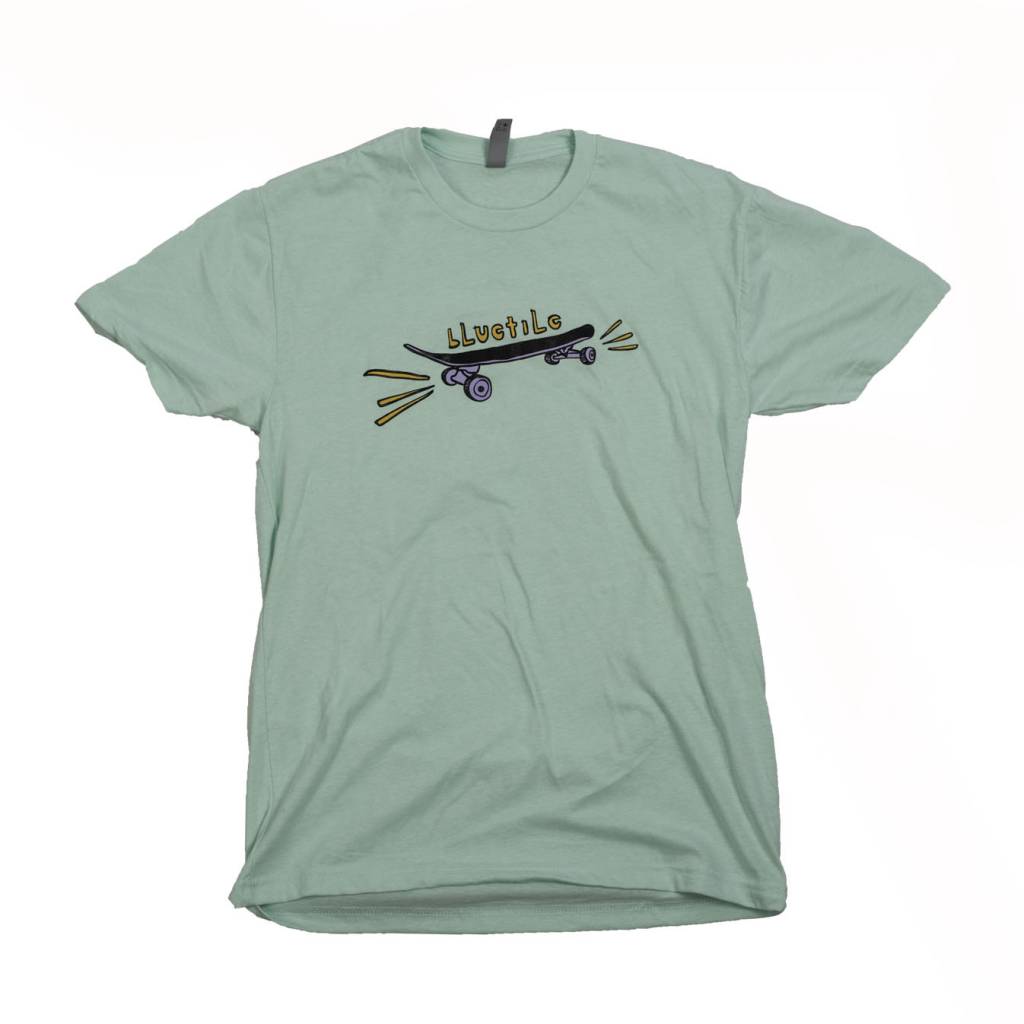 A bluetile x street canoe "bluetile" t-shirt mint / purple with a skateboard on it.