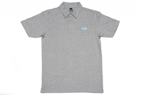 A BLUETILE SURPLUS LOVE BLUETILE POLO GREY / LIGHT BLUE polo shirt with a Bluetile Skateboards logo on it.
