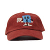 A BLUETILE PUFF SQUARE DAD HAT ANTIQUE RED hat with a cartoon character on it.