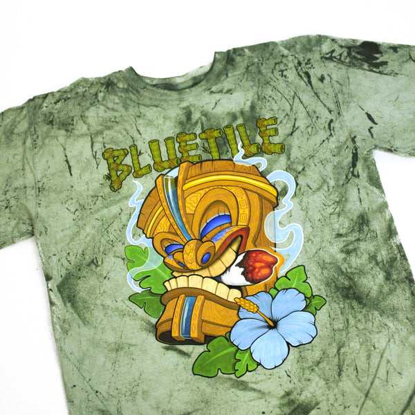 A BLUETILE TIKI T-SHIRT MAUI GREEN with an image of a tiki.