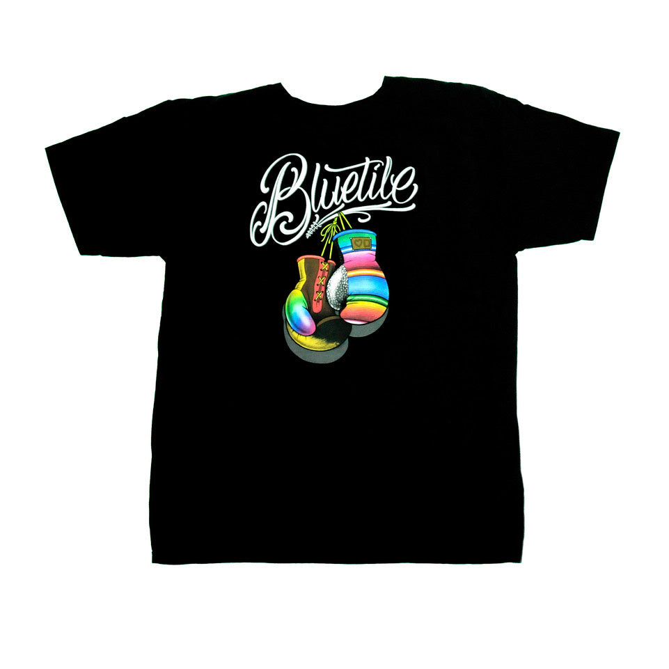 A Bluetile Skateboards black t-shirt with a colorful boxing glove on it.