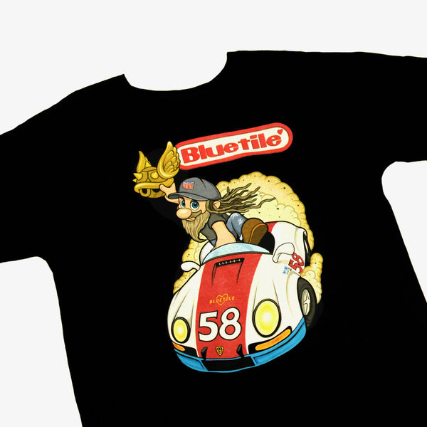 A BLUETILE STREET RACER T-SHIRT BLACK with a cartoon character riding a car. (Brand: Bluetile Skateboards)