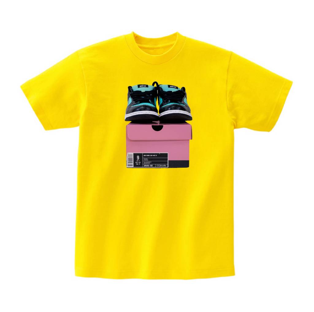 An iconic Bluetile Skateboards t-shirt featuring a pair of BLUETILE FRIENDS AND FAMILY T-SHIRT CANARY sneakers in yellow.