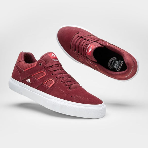 A pair of EMERICA TILT G6 VULC SKATESHOPDAY BRICK sneakers on a white background.