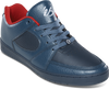 A leather navy shoe with a red accent.