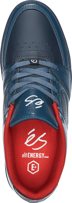 The top view of the navy shoe with a red inside.