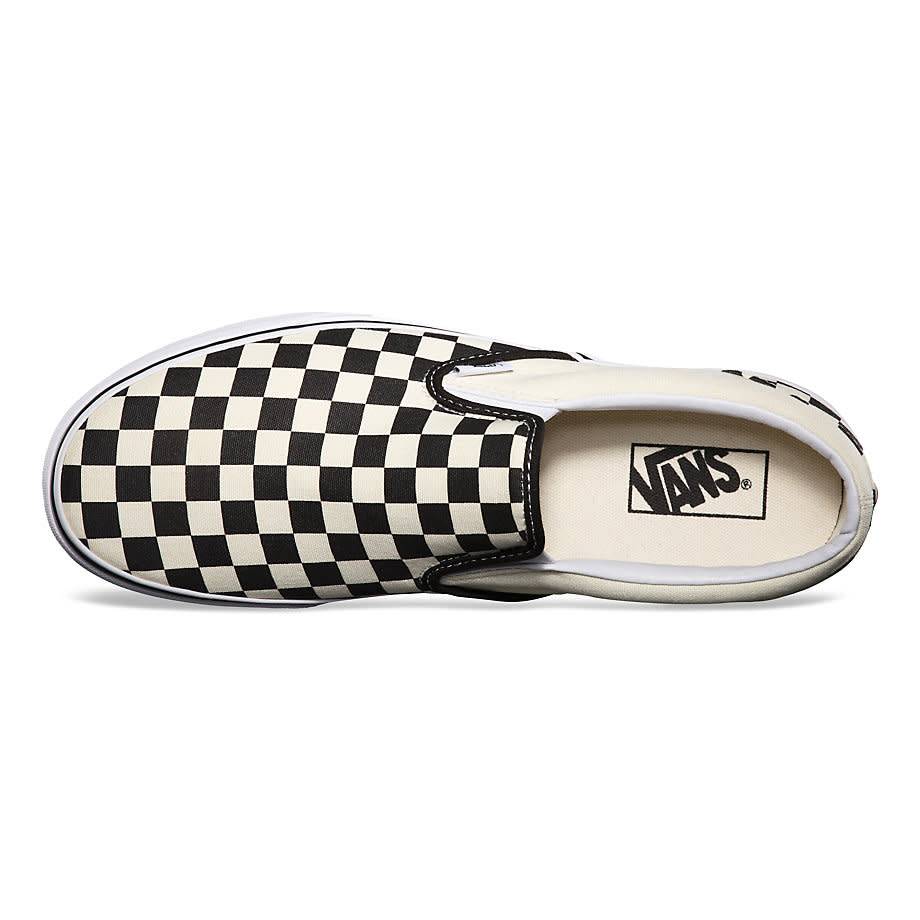 A VANS Classic Slip-On Black / White Checkerboard shoe.