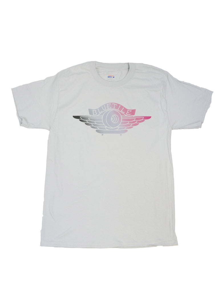 A BLUETILE NY TO PARIS JORDAN 1 T-SHIRT GREY with pink wings on it, inspired by Paris.
