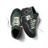 A pair of VANS X FORMER DESTRUCT MID MTE GREEN sneakers on a white background.
