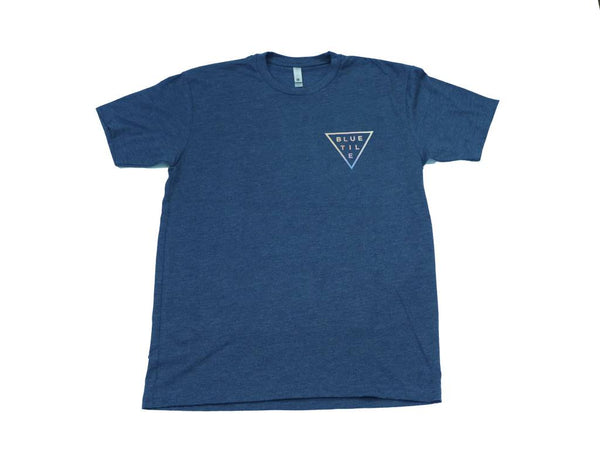 A BLUETILE TRI-DYE T-SHIRT STORM with a triangle on it.