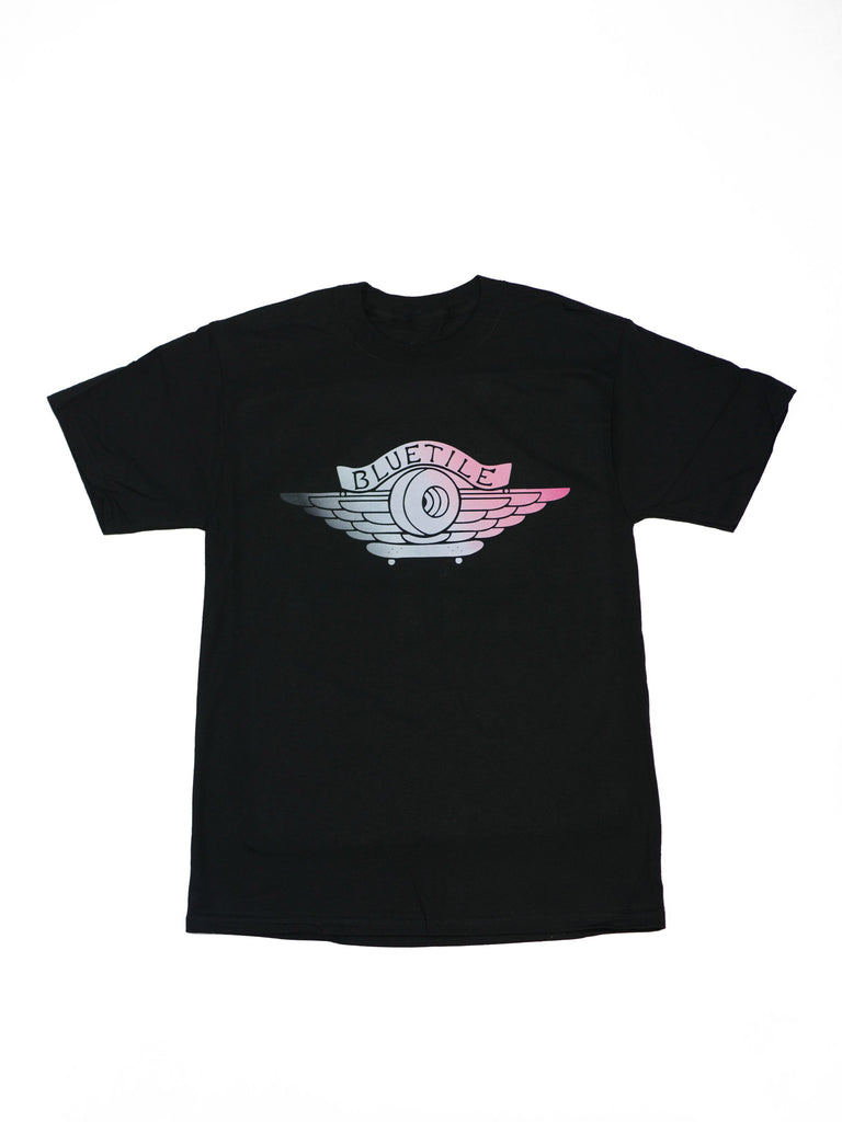 A black t-shirt with a pink logo on it, inspired by Bluetile NY To Paris Jordan 1 SB, by Bluetile Skateboards.