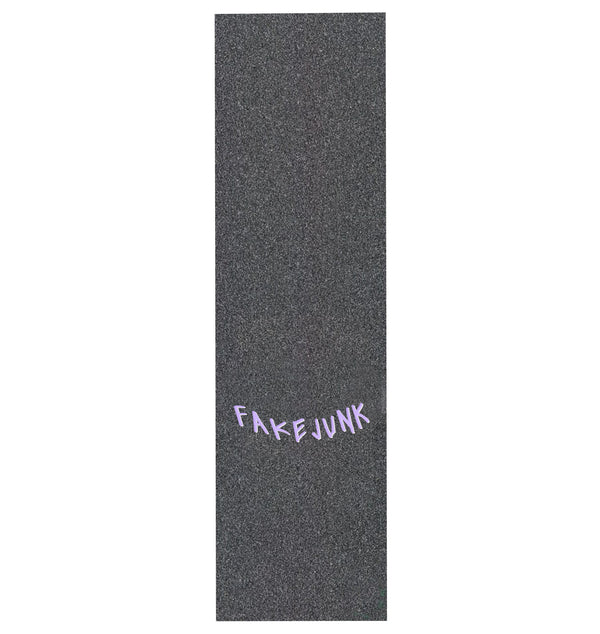 The FAKE JUNK GRIPTAPE MOREGRIP FORMULA by FAKE JUNK is a rectangular black sheet featuring "FAKEJUNK" in purple, uneven letters near the bottom, crafted for durability and lasting performance.
