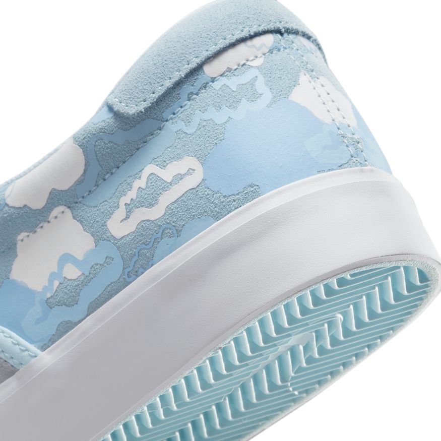 A pair of blue and white sneakers with a camouflage pattern from NIKE SB X RAYSSA LEAL VERONA SLIP GLACIER BLUE by Nike.