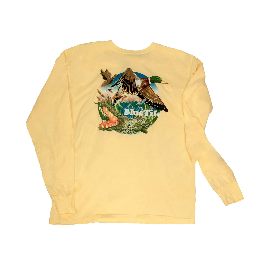 A BLUETILE WILDERNESS DUCKS LONG SLEEVE SUMMER SQUASH t-shirt featuring an image of a duck surrounded by birds.