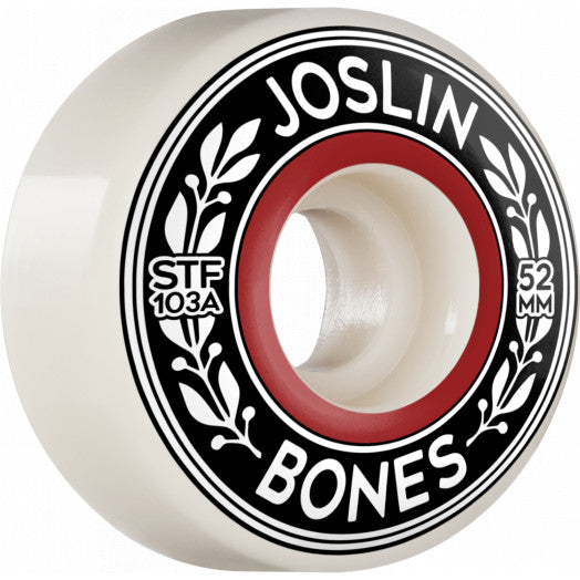 A white BONES skateboard with a black and red logo.
