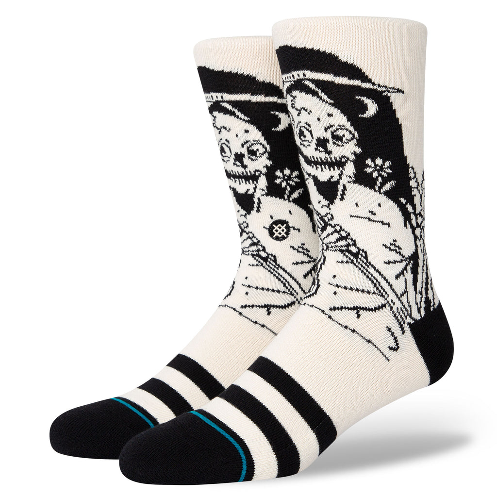 A pair of STANCE SOCKS RITO OFF WHITE LARGE with an illustrated design featuring skeletal figures and floral motifs, crafted with durable Infiknit™ technology.