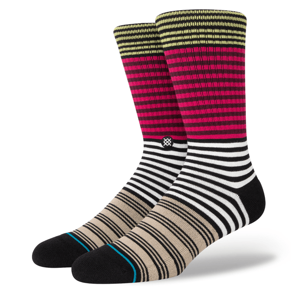 A pair of STANCE DIATONIC MAGENTA LARGE socks with contrasting colors displayed against a white background.