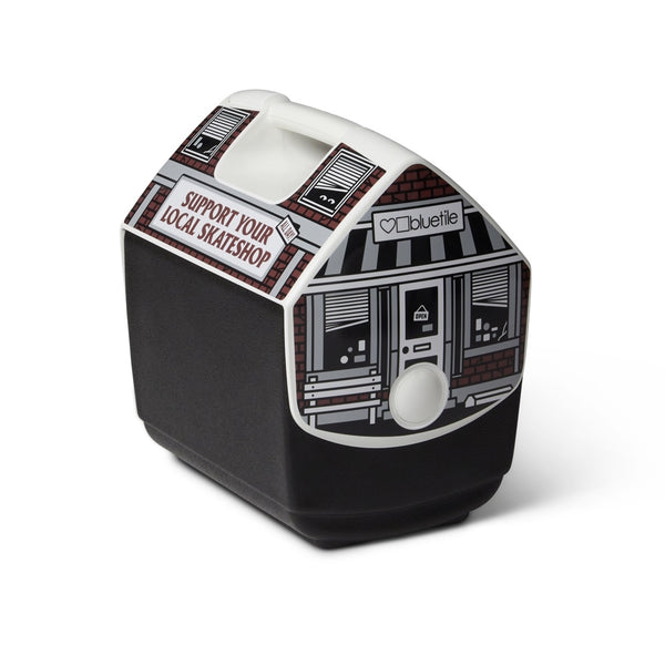 A limited edition Bluetile Skateboards BLUETILE X IGLOO SKATESHOPDAY 7QT cooler with a black and white design.