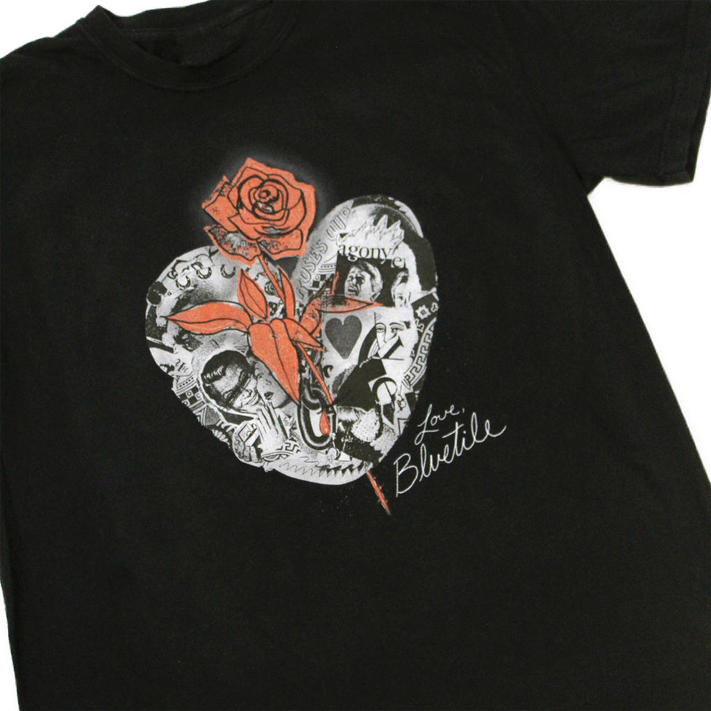 A Bluetile Skateboards BLUETILE COLLAGE HEART T-SHIRT BLACK with a skull and rose design.