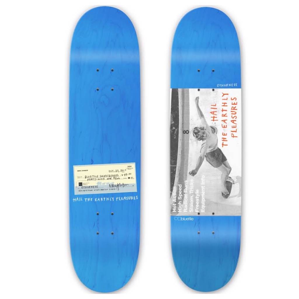 A Bluetile Skateboards BLUETILE X OTHERNESS MARC JOHNSON 7.75 EARTHLY PLEASURES skateboard with a picture of a skateboarder.
