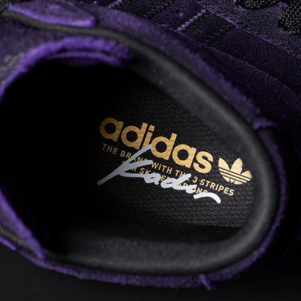 A close up of a purple ADIDAS KADER SYLLA PRO MODEL ADV CORE BLACK/DARK PURPLE shoe.