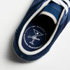 A close up of a CONVERSE CONS X ALLTIMERS ONE STAR PRO MIDNIGHT NAVY tennis shoe on a white surface.