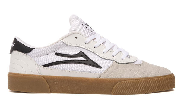A Lakai Cambridge White / Black sneaker with a gum sole.