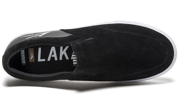 A black and white LAKAI OWEN VLK slip-on shoe with the word "lake" on it, by LAKAI.