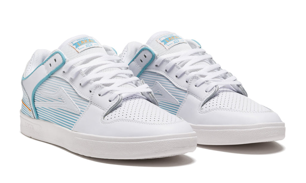 The LAKAI ROB WELSH TELFORD LOW WHITE LEATHER sneakers feature white canvas with a touch of blue accents.
