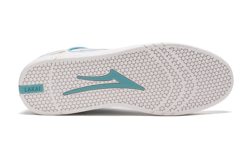 A white and turquoise LAKAI ROB WELSH TELFORD LOW WHITE LEATHER shoe with the logo on the side.